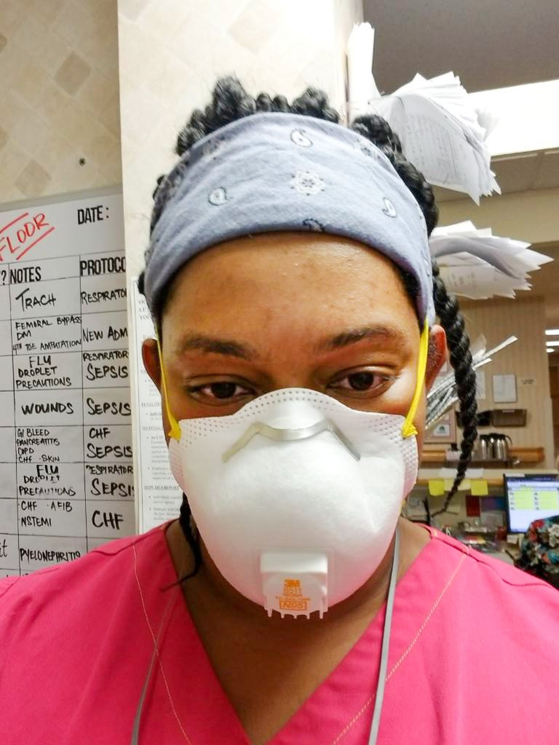 Shelly Hughes Caregiver in N95 mask at work